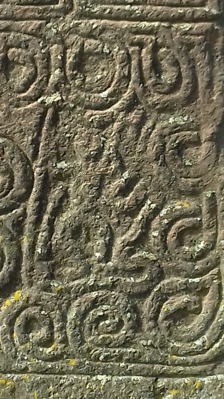 details of the carving of the god Odin 