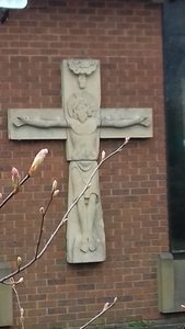 The sculpture on the side of the joint Salvation Army Hall and the Catholic church