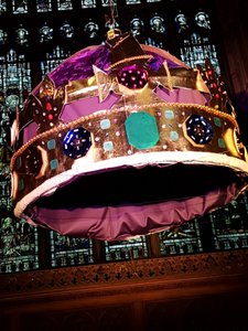 The massive crown hanging from the roof 