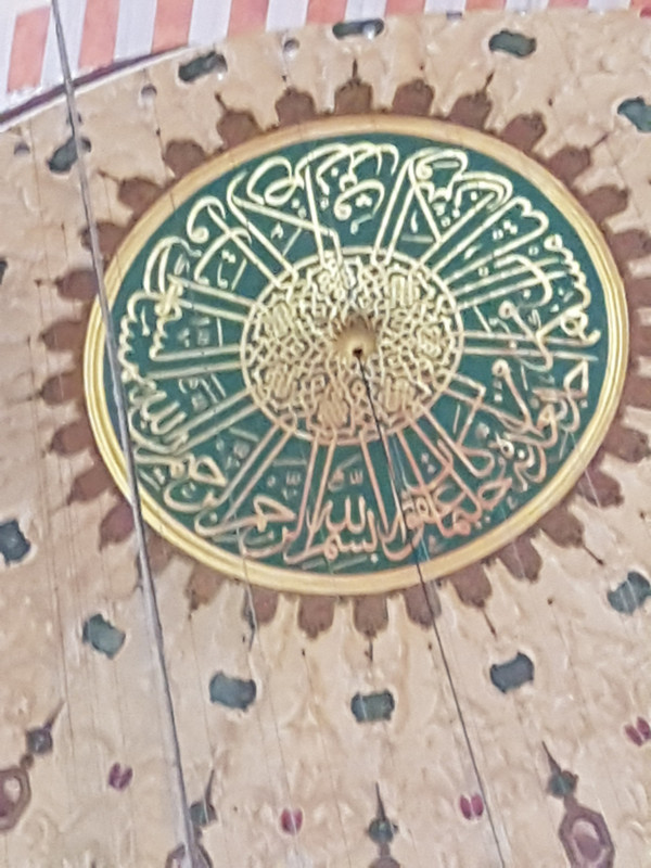 One of the domes and the calligraphy 