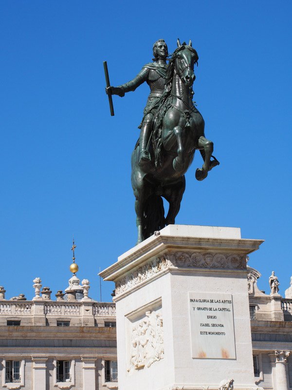 statue against blue sky 