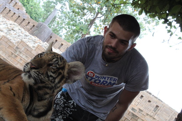 Dan with a tiger cub