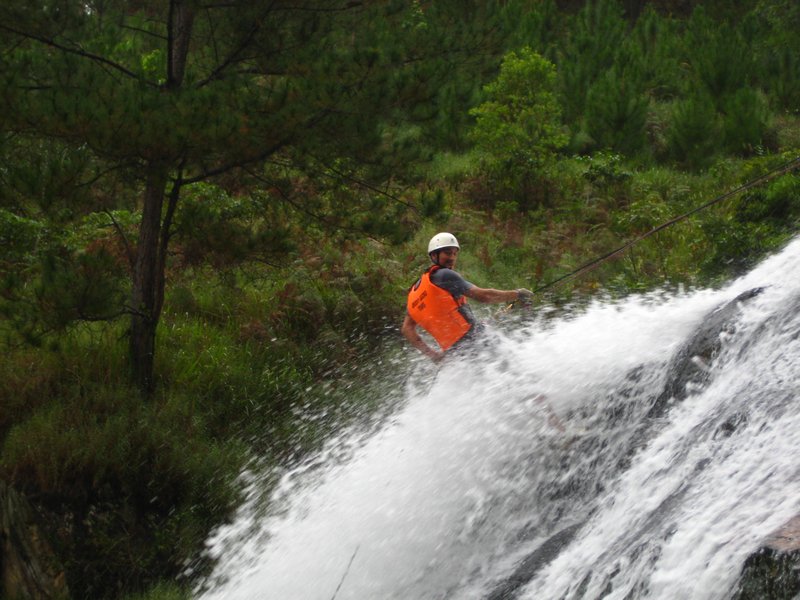 Andy abseiling down the 25 metre falls