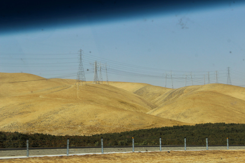 power lines over the golden hills