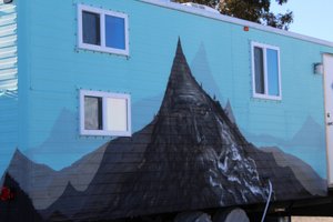 painting on the outside of someone's camper. The old man of the mountain