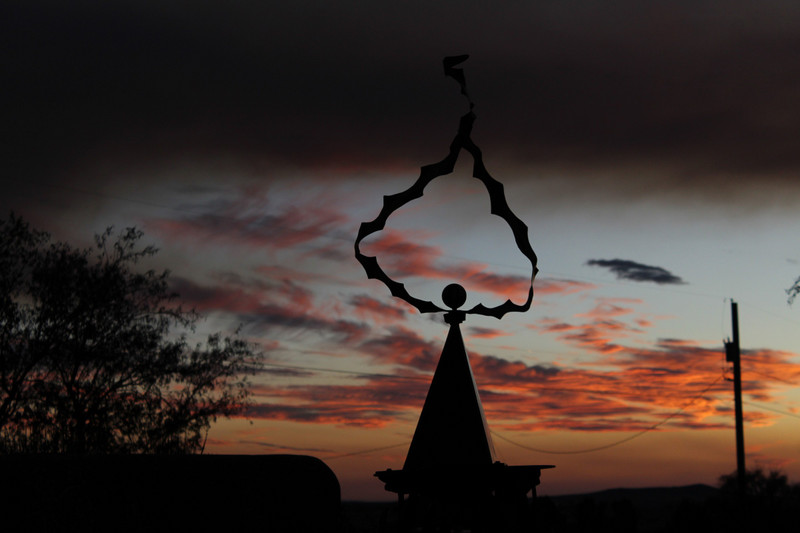 sculpture with the sunset