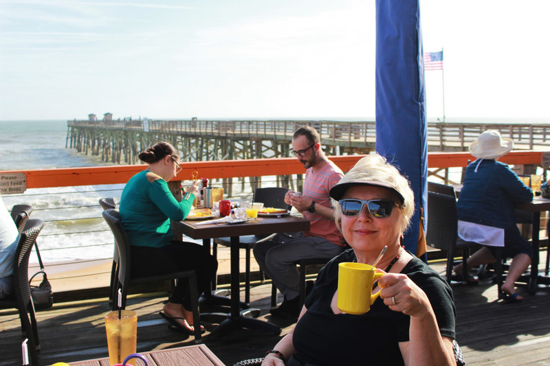 having breakfast on the pier