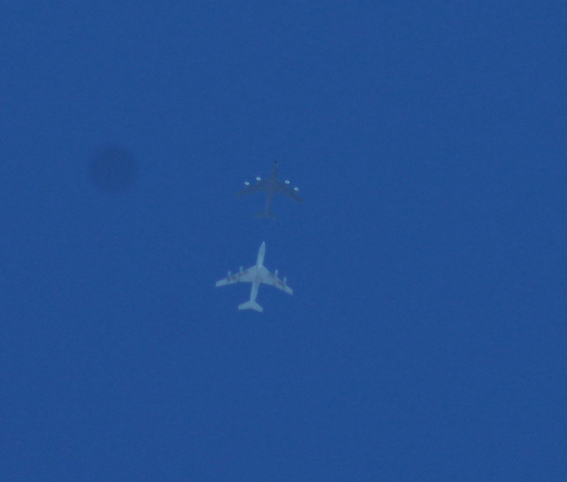I think this is a plane refueling in mid air