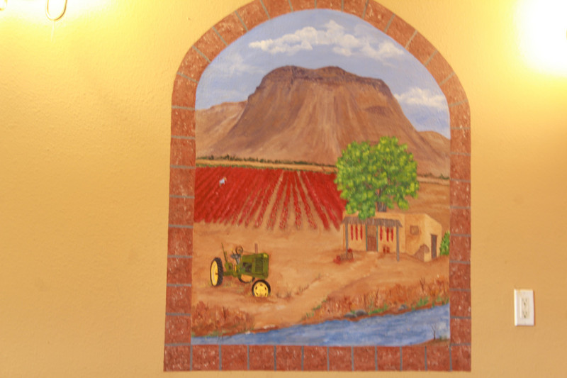 mural on wall of a chili field