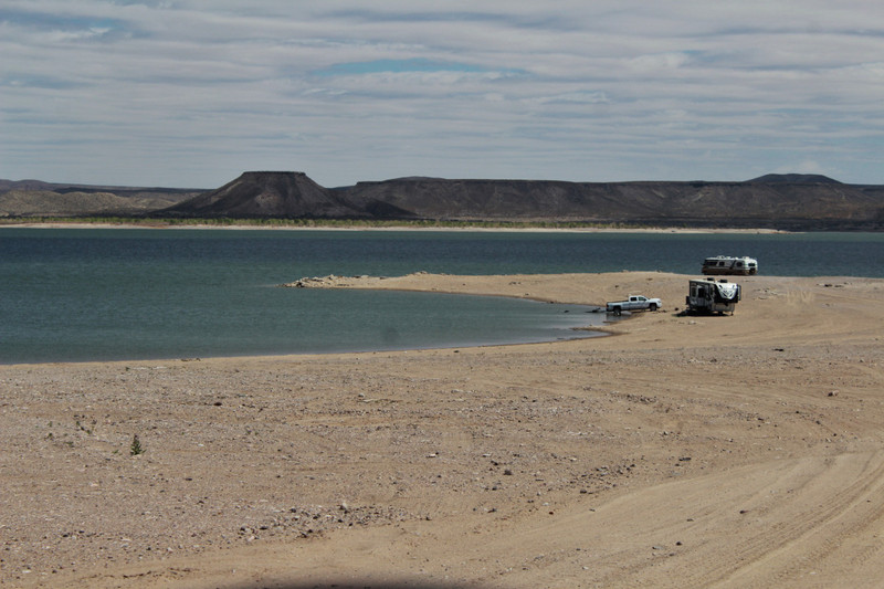 beach campsite, elephant butte in the background