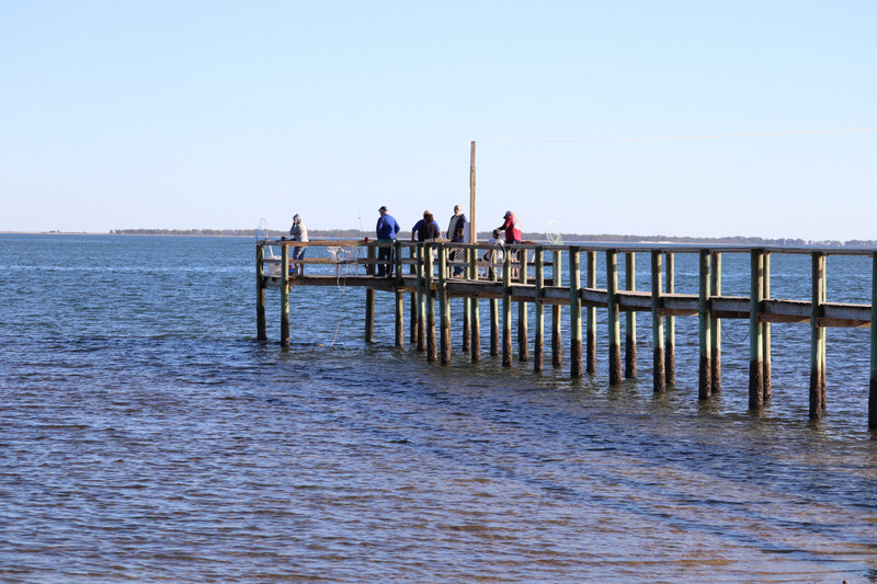 repaired fishing pier with the tide in