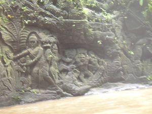 Intricately carved rocks on the river