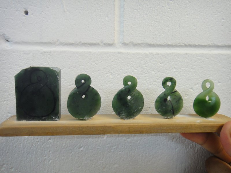 Different stages of carving Jade