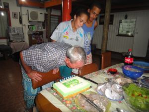 Uncle blowing out the candles