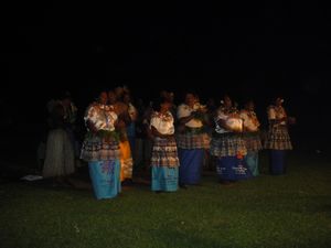 The village women singing and dancing