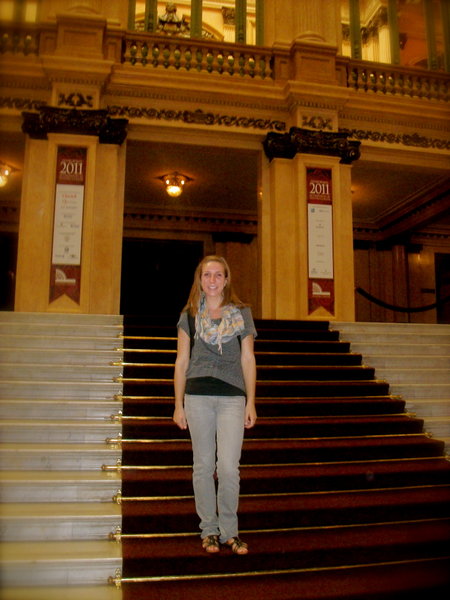 me on the steps leading up to the theater