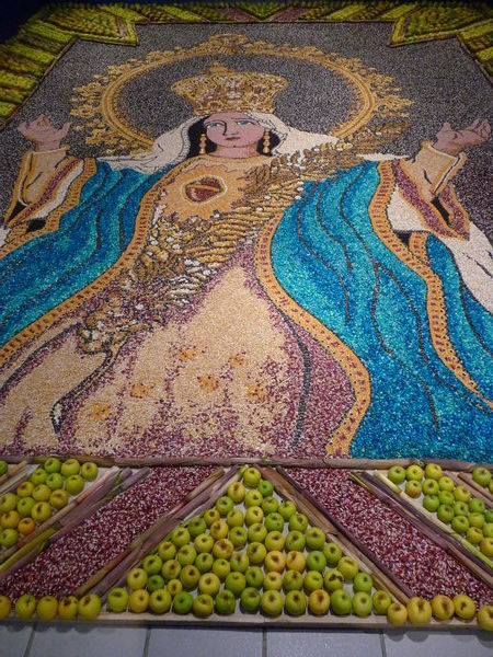 Image of Mary made with fruit and grains