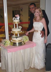 The happy couple cutting cake