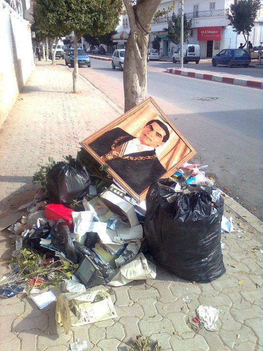 Ben Ali pictures in the bin!