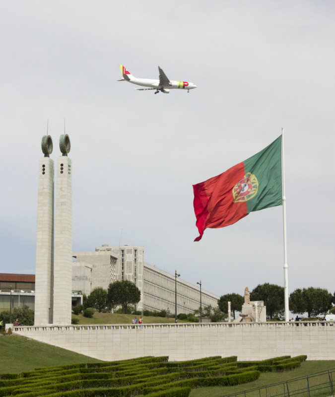 TAP flying past the giant Portuguese flag