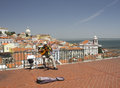 A busker on the Lisbon rooftops