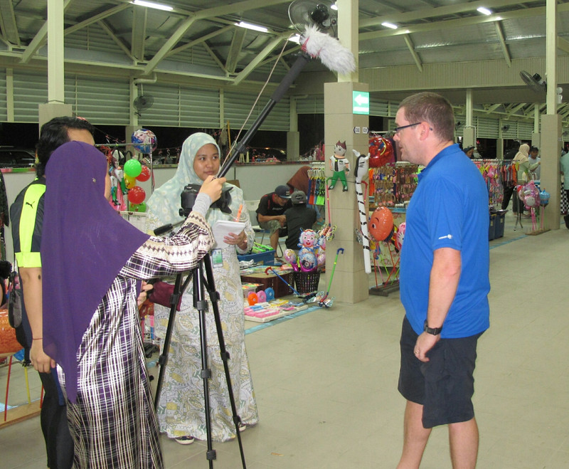 Being interviewed at the night market
