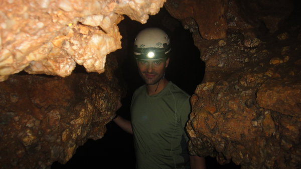 climbing through the cave