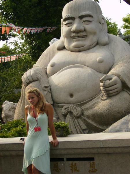 Buddha and his posing girl