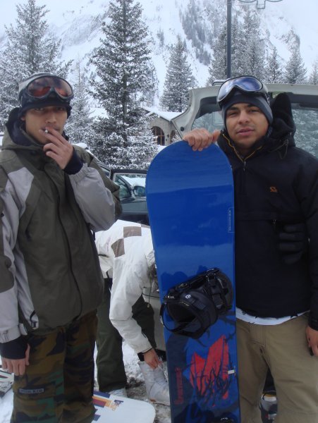 Djamel, the happy owner of a new snowboard