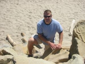 Random California Beach - Aaron climbs up from the shore