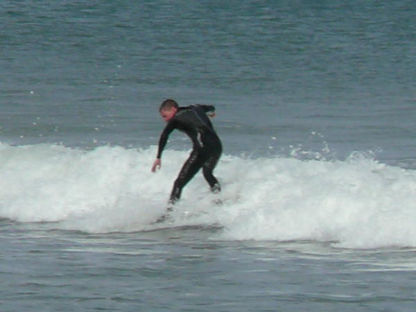 Mike surfing in Porpoise Bay