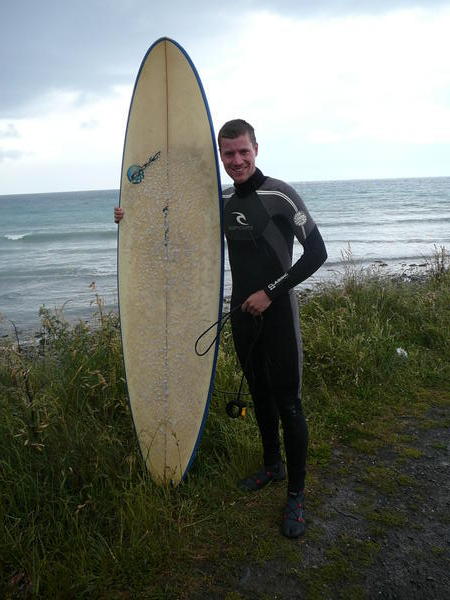 Mike in his new gear - surfboard and wetsuit!