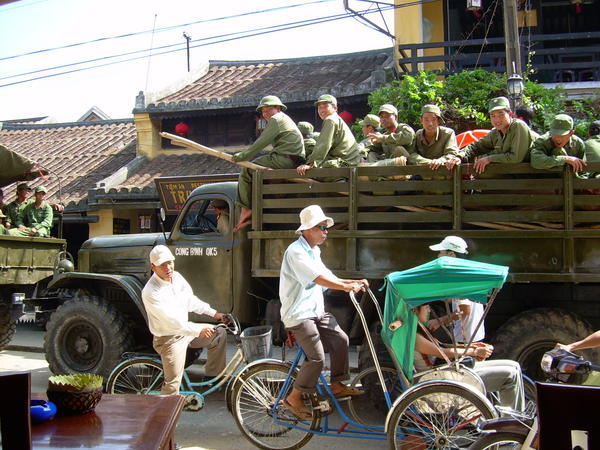 army trucks and bicyles