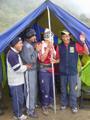 Our porters, wet but smiling...