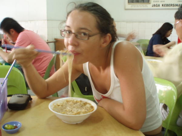 Louise eating a local noodle dish