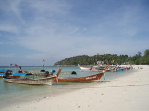 Some of the many longtail boats along the beach