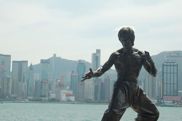 Bruce Lee against HKG skyline