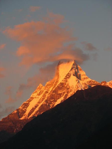 Machhapuchhre at sunset with a cool cloud cap