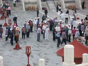 Chinese tourists in Temple of Heaven (they always wear matching hats, and sometimes tracksuits aswell)