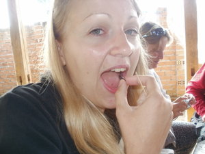 Katie eating a cricket!