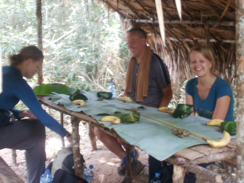 lunch on bamboo table with banana leaf table cloth
