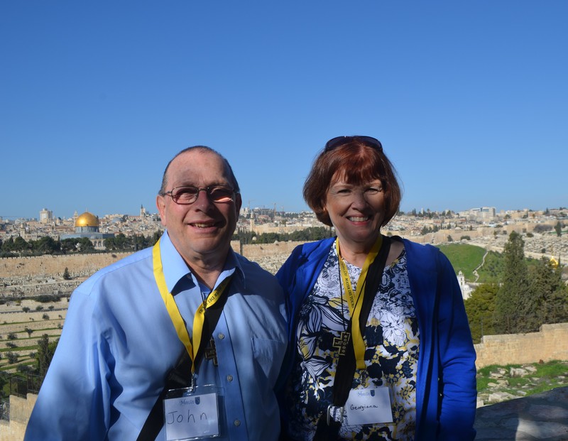 At the Garden of Gethsemane with Jerusalem in the background.