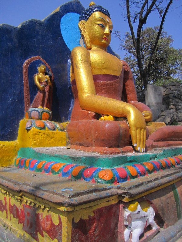 One of the many Buddhas that greet you as you begin your climb
