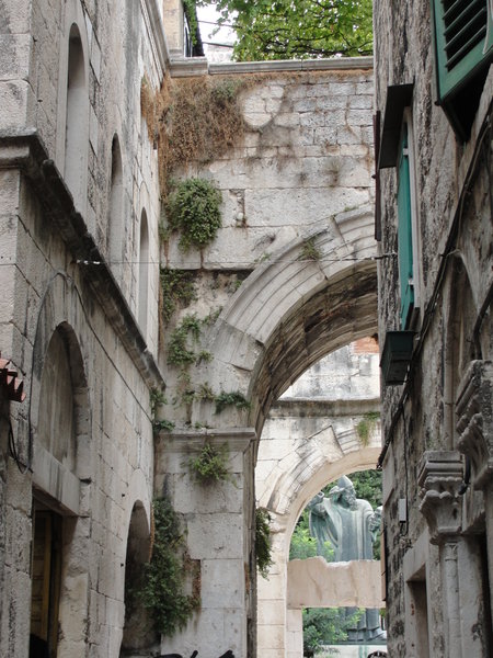 Looking at the Golden Gate of the Diocletian​'s Palace in Split Old Town