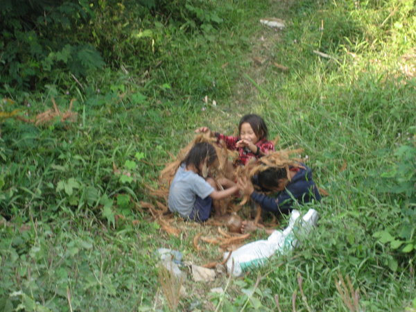 Children Playing with coconut husks 