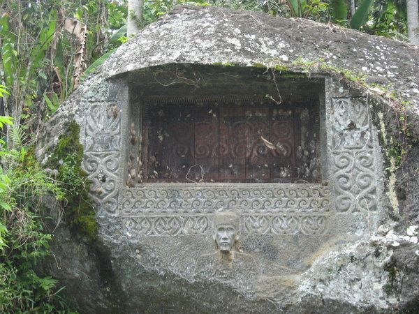 A grave made in the rockface.