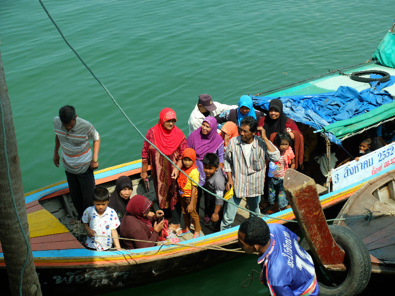 Locals arriving on the island