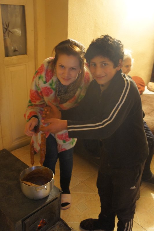 Mikaela and host brother cooking 