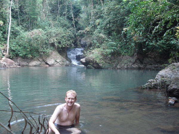 Me in the waterfall by our treehouse during the gibbon experience