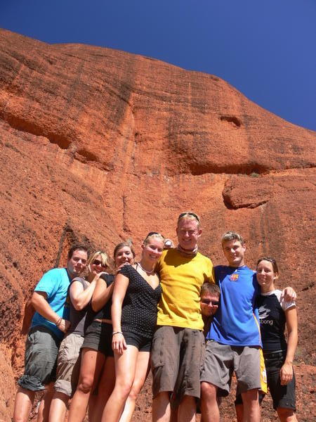 We all pose at The Olgas under a big rock!